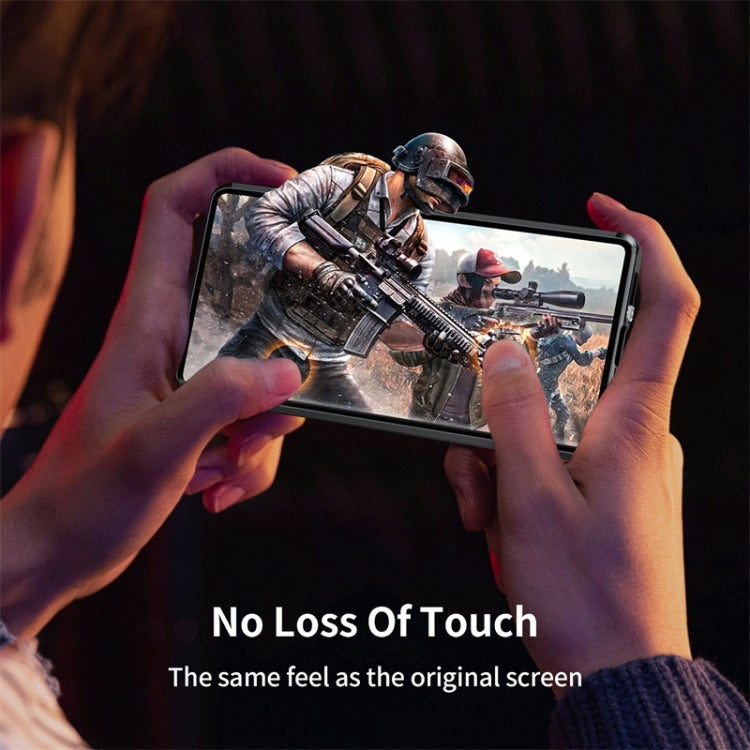 Black magnetic tempered glass phone case on a phone held by hands