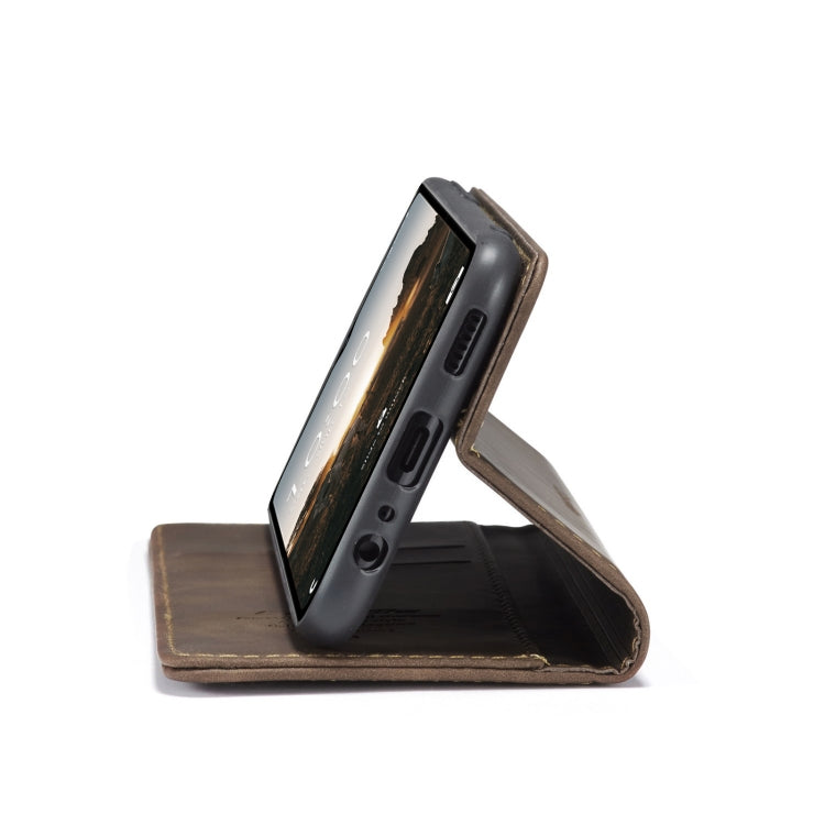 Dark leather flip phone case with stand, angled view