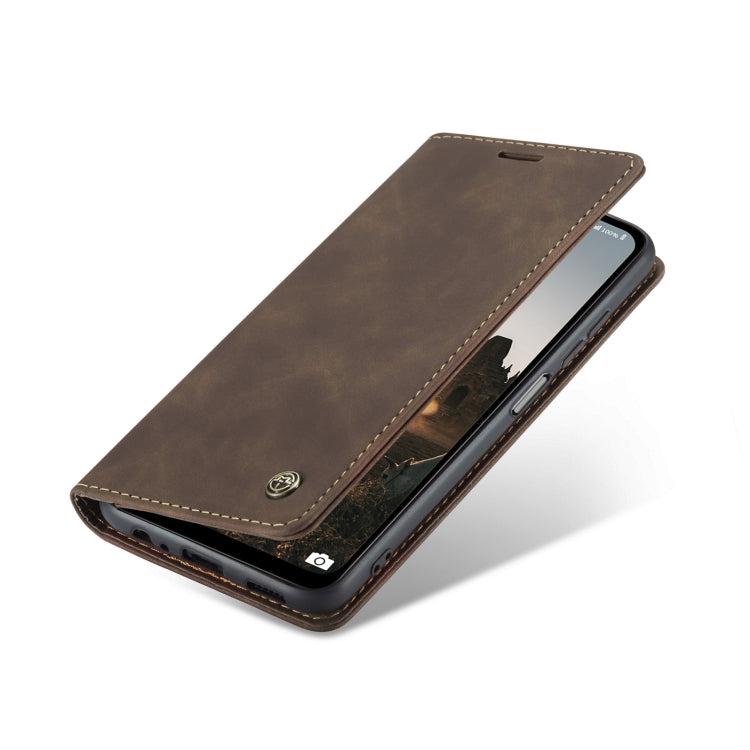 Brown leather flip phone case with stitched edges and magnetic closure
