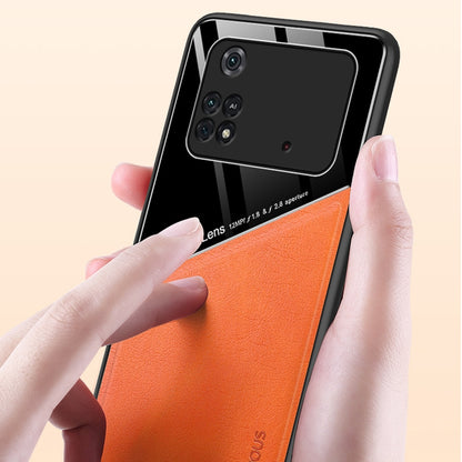 All-inclusive leather and organic glass protective case with black shell and orange panel