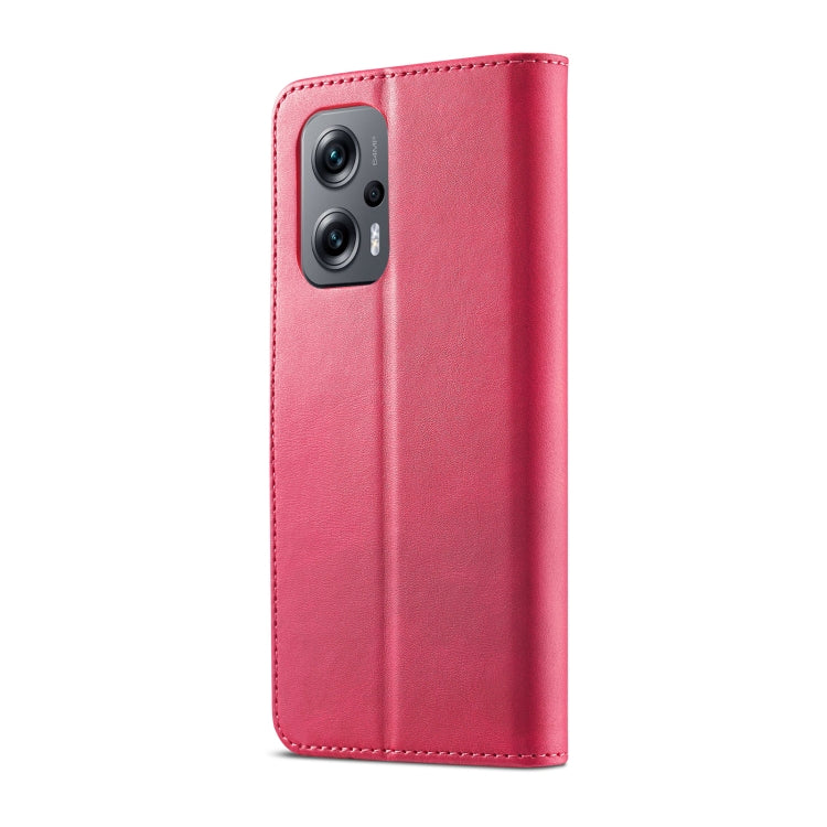 Red calf-textured leather phone case with camera cutout and stitched trim.