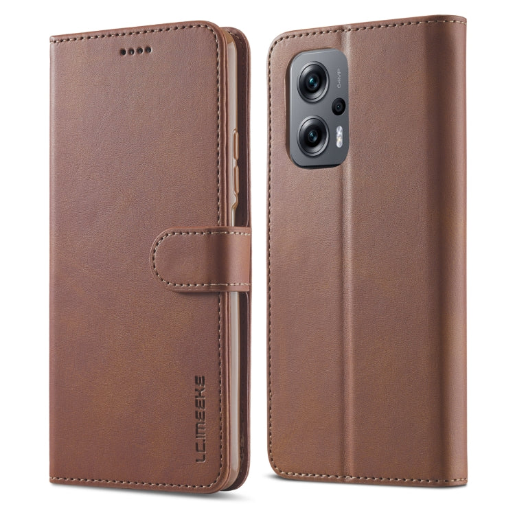 Brown calf-textured leather wallet phone case with folio front and stitched trim.