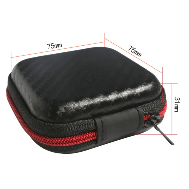 Black headphone storage case with red piping, zippered opening, and soft inner lining.