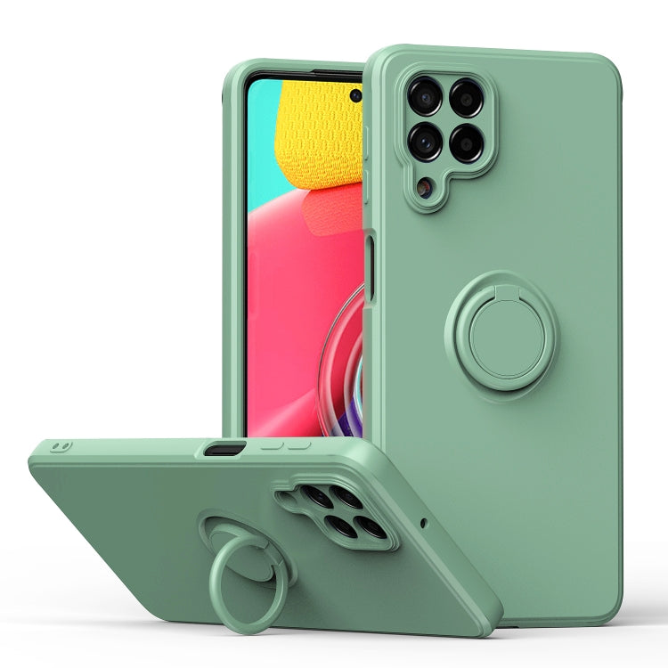 Mint green silicone phone case with ring kickstand and camera cutouts, protective cover