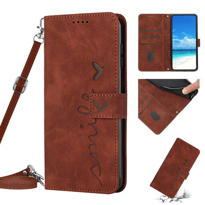 Brown leather phone case with lanyard strap, heart pattern and flip cover