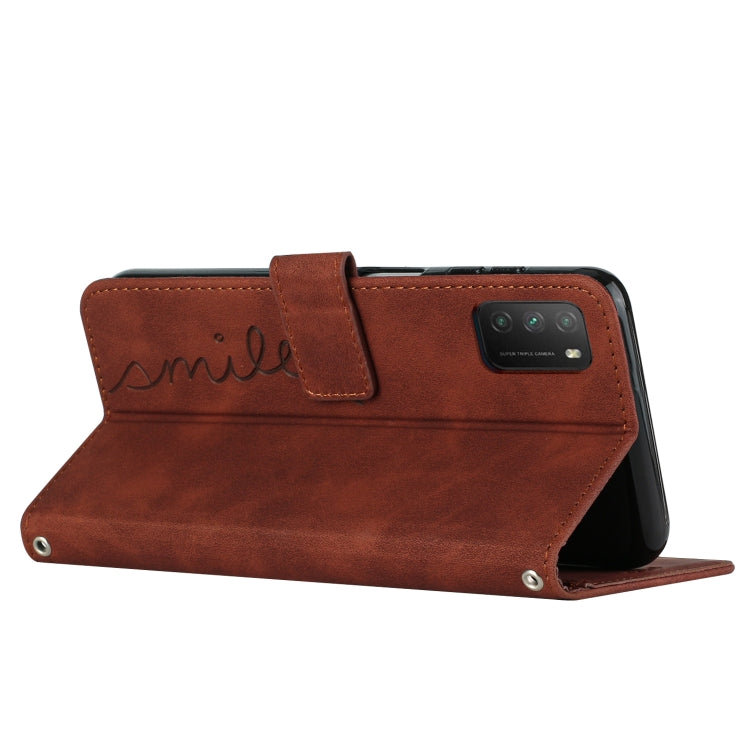 Brown leather folio phone case with heart pattern and kickstand-style support