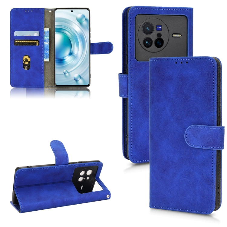 Blue magnetic flip leather phone case with folio cover and magnetic closure strap