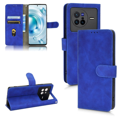 Blue magnetic flip leather phone case with folio cover and magnetic closure strap