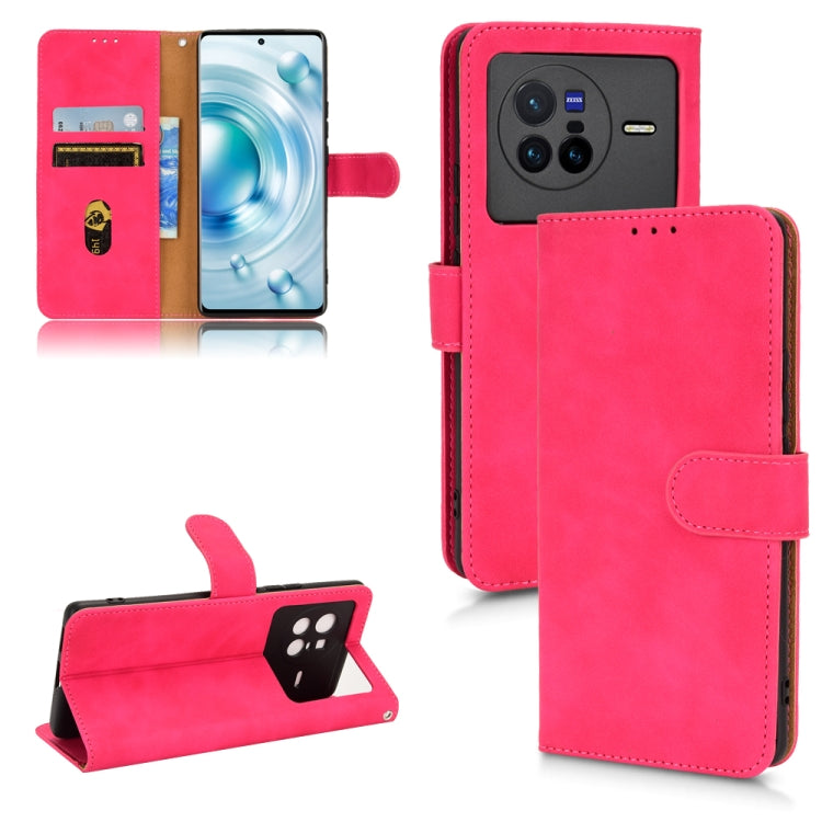 Red/pink magnetic flip leather phone case with card slots and camera cutout