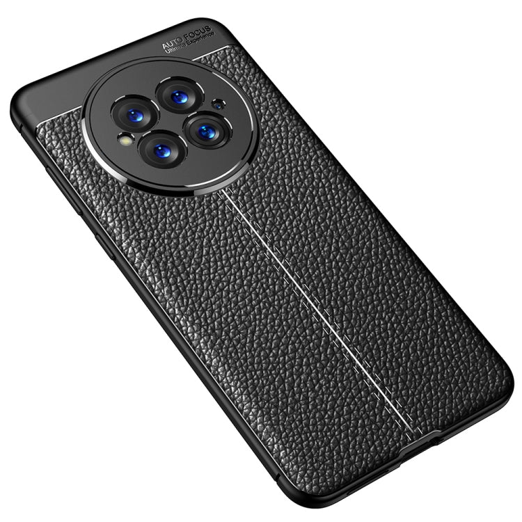 Black textured TPU phone case, angled view showing four-camera bezel detail