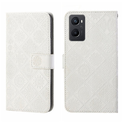 White embossed pattern leather wallet phone case with fold-over strap and cutout