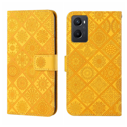 Yellow embossed pattern leather wallet phone case with fold-over strap and camera cutout