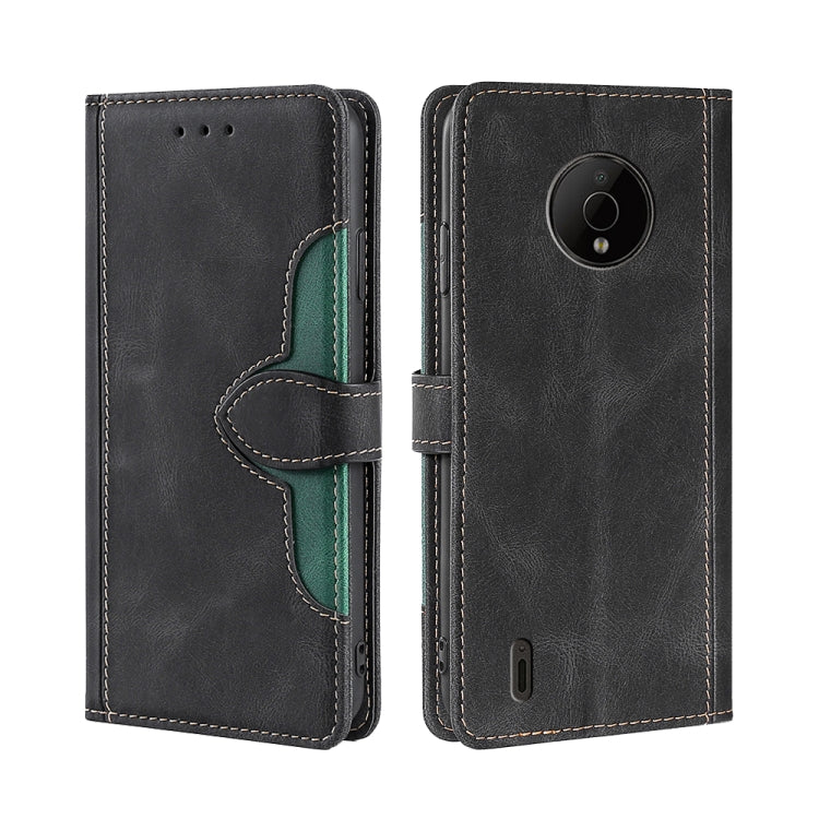 Black leather magnetic buckle phone case with camera opening and green accent strap