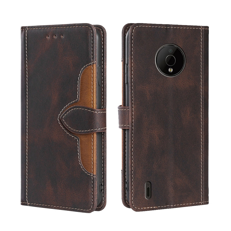 Brown leather magnetic buckle phone case with camera opening and side button cutout