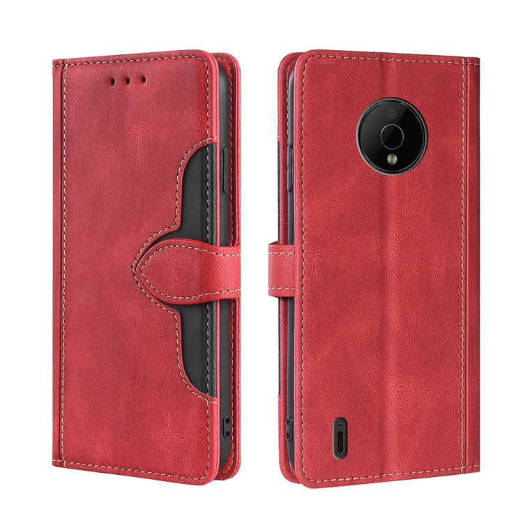 Red leather magnetic buckle phone case with front flap and camera opening
