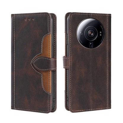 Brown leather phone case with magnetic buckle strap, camera lens cutout, detailed stitching.