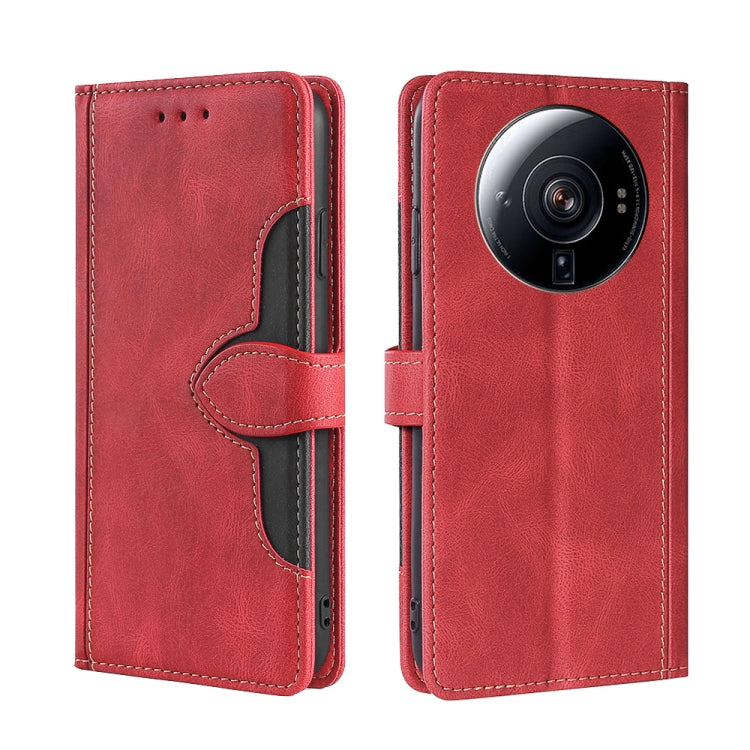 Red leather phone case with magnetic buckle, camera lens cutout, stitched card holder design.