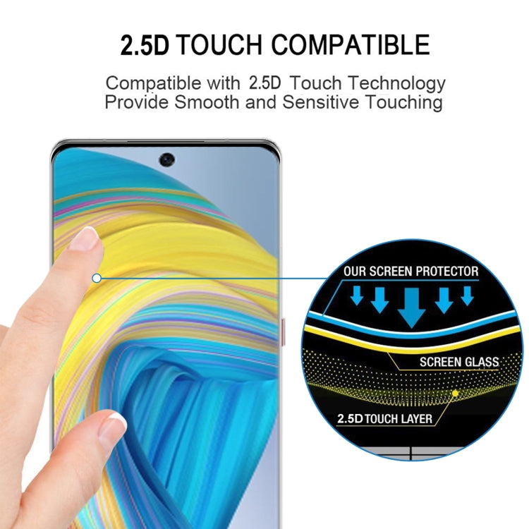 Tempered glass screen protector being aligned on a phone screen with rounded edges