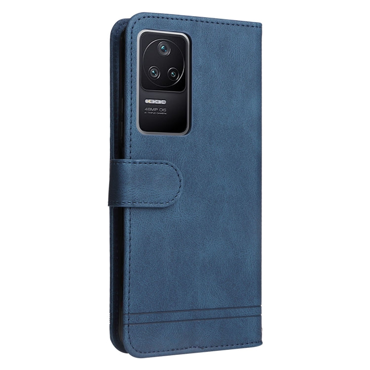 Blue leather wallet phone case with button closure and cutout for camera area.