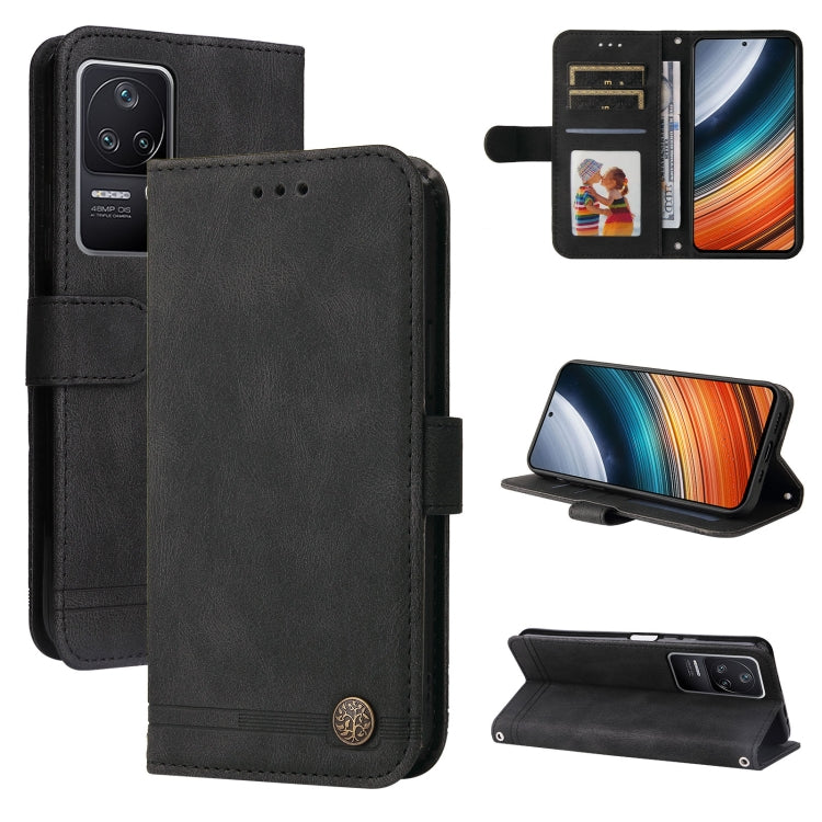 Black leather wallet phone case with metal button, side strap, and card slots.