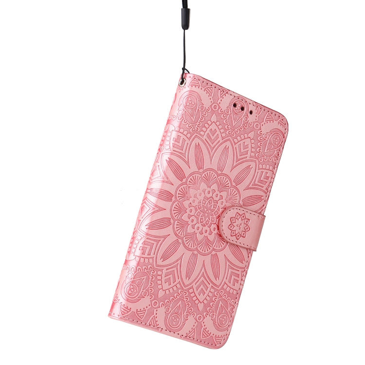Pink embossed sunflower leather phone case with wrist strap, flip cover
