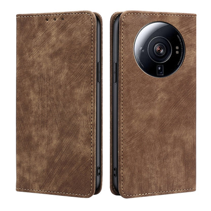 Brown magnetic leather phone case with lens cutout and stitched side openings