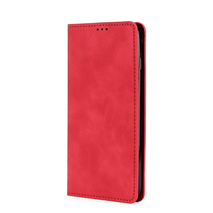 Red leather phone flip case, front cover closed with top speaker cutouts and stitching