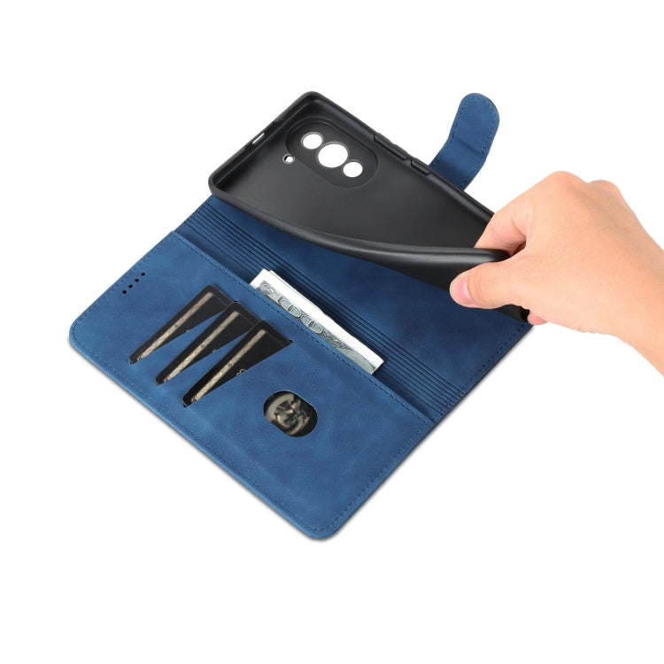 Blue flip leather phone case open with card slots, hand grip tab, and camera alignment