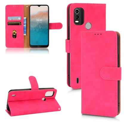 Pink leather flip phone case with magnetic closure and card slots