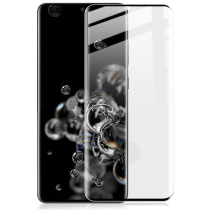 Tempered glass screen protector film covering smartphone front, clear curved fit
