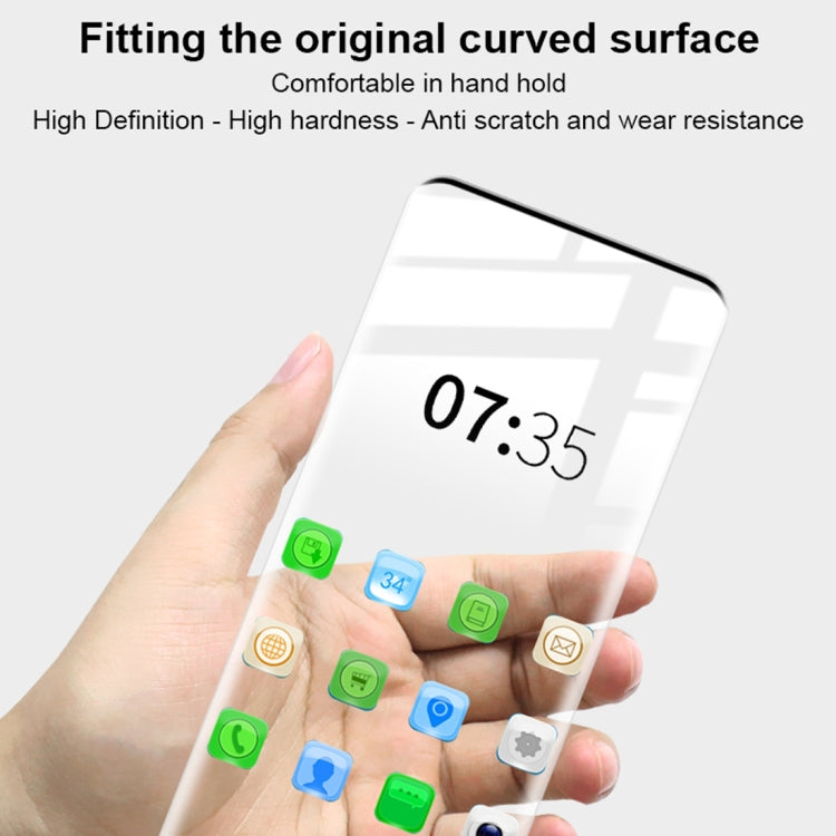Tempered glass screen protector in hand, clear curved glass with rounded corners
