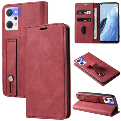 Red magnetic leather phone case with wrist strap, stitched trim, and camera opening