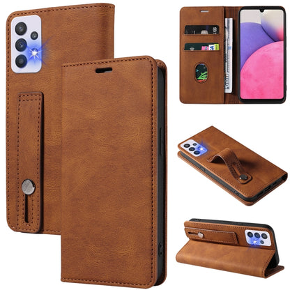 Tan leather wallet phone case with magnetic flap, wrist strap, and card slots
