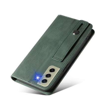 Green leather flip phone case with magnetic closure and wrist strap; rear camera cutouts