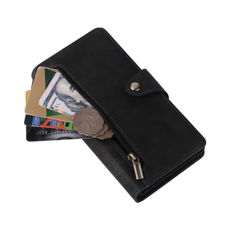 Black leather phone case with card sleeve and zip pocket, snap closure