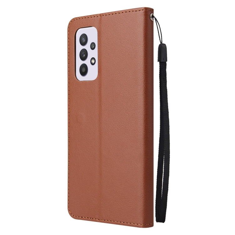 Brown leather flip phone case with wrist strap