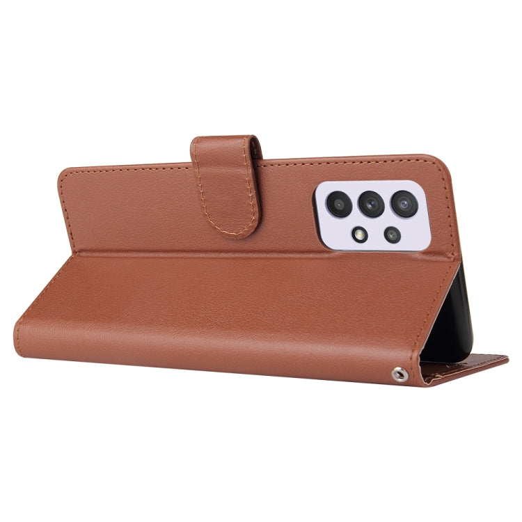 Brown leather folio phone case with card slot and camera cutout