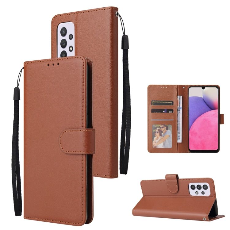 Brown leather folio phone case with card slots and wrist strap