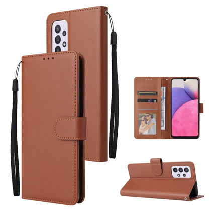 Brown leather folio phone case with card slots and wrist strap