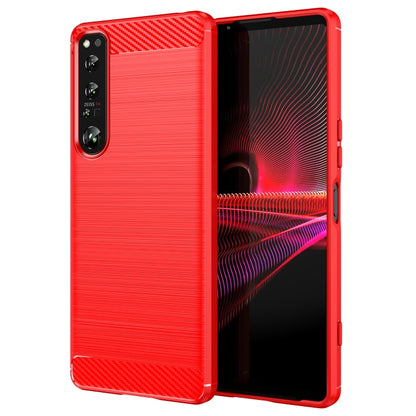 Red brushed texture TPU phone case with carbon fiber accents and camera cutout