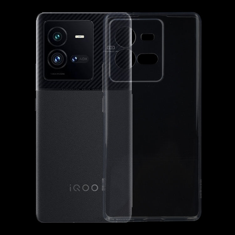 Transparent TPU phone case with side slot and camera openings over a black phone.