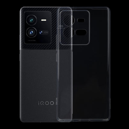 Transparent TPU phone case with side slot and camera openings over a black phone.