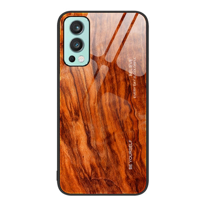 Wood grain glass phone case with orange wood pattern and camera cutouts, black trim