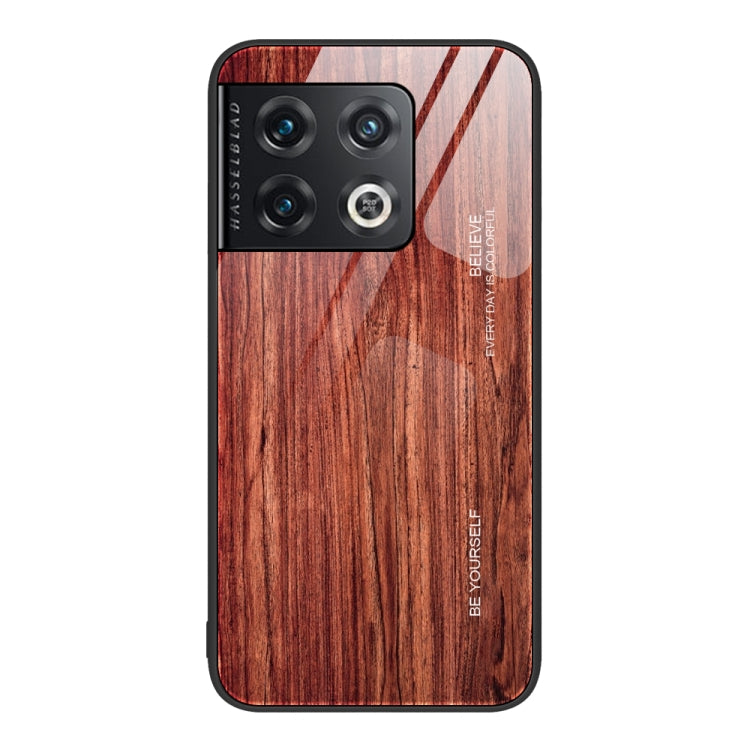 Wood grain glass phone case with camera cutouts and reddish wood plank design