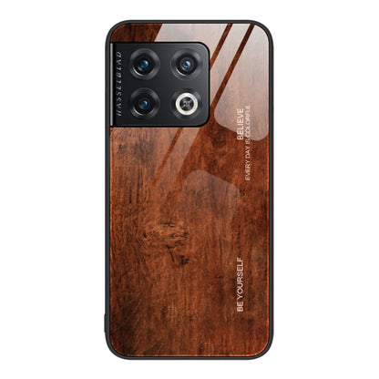 Wood grain glass phone case with camera cutouts and dark rust wood swirls