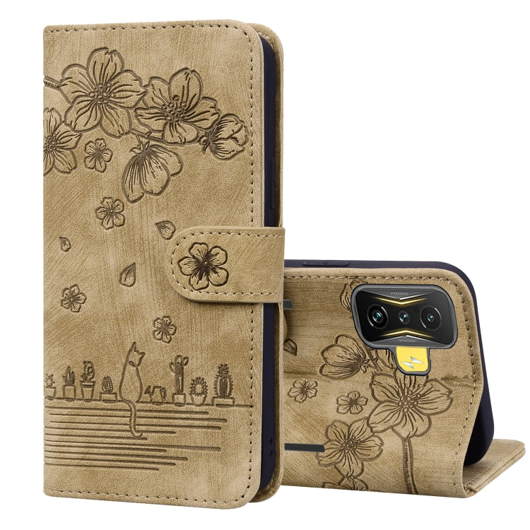 Beige embossed leather phone case with floral sakura cat design, folio stand