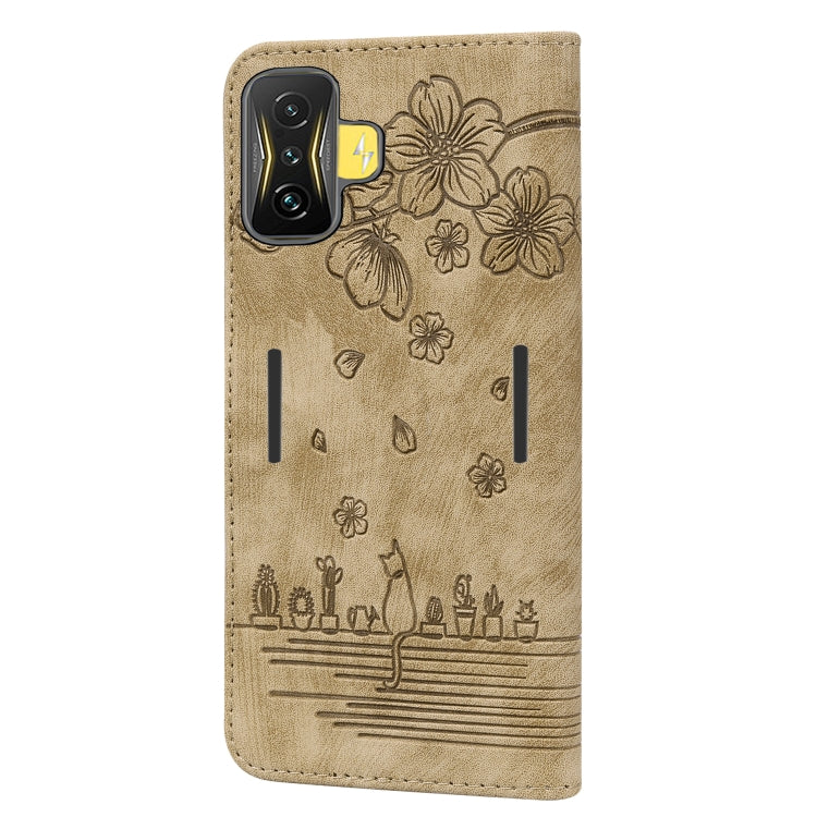 Beige embossed leather phone case with sakura cat floral design and camera cutout