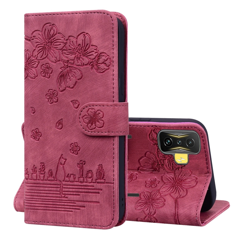 Rose red embossed floral flip phone case with strap, card holder, and kickstand