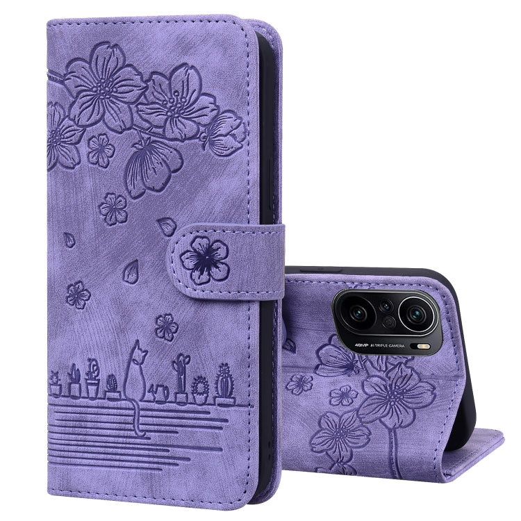 Lavender embossed floral flip phone case, stand open, with camera cutout