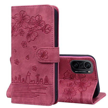 Rose pink faux leather phone case wallet with embossed sakura flowers and camera cutout